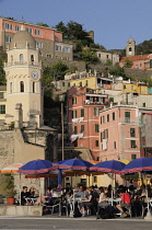 Italy, Liguria, Cinque Terre, Vernazza, alfresco dining on the waterfront.