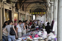 Italy, Lombardy, Mantova, market stalls amongst the colonnades, Piazza Erbe.