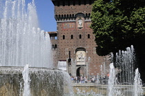 Italy, Lombardy, Milan, fountain & Filarete Tower, Sforza Castle.