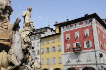 Italy, Trentino Alto Adige, Trento, fountain & buildings on Piazza Duomo with Hotel Venezia.