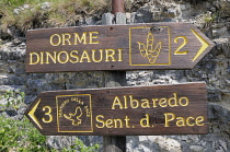 Italy, Trentino Alto Adige, Rovereto, Piste de Dinosauri signs.