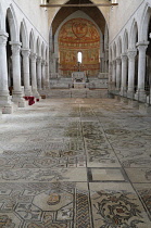 Italy, Friuli Venezia Giulia, Aquileia, Basilica interior with Roman mosaic floor.