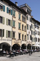 Italy, Friuli Venezia Giulia, Udine, cafes lined along Piazza Mateotti.