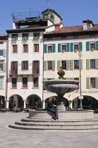 Italy, Friuli Venezia Giulia, Udine, Piazza Mateotti & fountain.