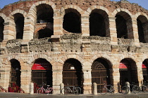 Italy, Veneto, Verona, Arena arches in warm light, Piazza Bra.