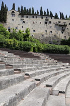 Italy, Veneto, Verona, theatre steps with Castle San Pietro backdrop, Teatro Romano.