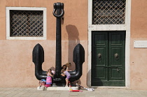 Italy, Veneto, Venice, Museo Storico Navale, anchor with children playing.