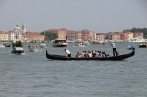 Italy, Veneto, Venice, busy waters, transportation on the Grand Canal.