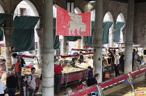 Italy, Veneto, Venice, Rialto fish market, stalls in covered market.