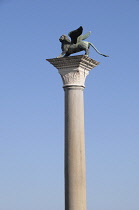 Italy, Veneto, Venice, The winged Lion of Saint Mark on the column of San Marco in the piazzatta.
