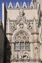 Italy, Veneto, Venice, window detail with Doge & Lion, Palazzo Ducale.