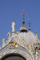 Italy, Veneto, Venice, statue & domes, Basilica San Marco.