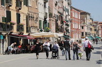 Italy, Veneto, Venice, cafes & street scene on Via Garibaldi.