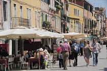 Italy, Veneto, Venice, cafes & street scene on Via Garibaldi.