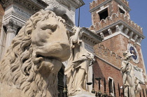 Italy, Veneto, Venice, Arsenale, stone lion & statues with Arsenale entrance.