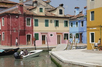 Italy, Veneto, Venice, Burano, canalside scene.