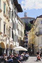 Italy, Friuli Venezia Giulia, Udine, Piazza Mateotti with cafes & view to Castle.