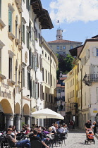 Italy, Friuli Venezia Giulia, Udine, Piazza Mateotti with cafes & view to Castle.