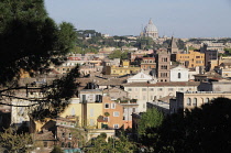 Italy, Lazio, Rome, Aventine Hill, Parco Savelli, views across to St Peter's Dome.