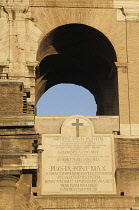 Italy, Lazio, Rome, Colosseum, arch detail in warm light.