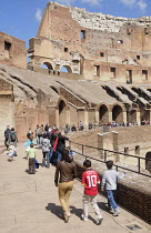 Italy, Lazio, Rome, Colosseum, interior view of the Colosseum with people walking around.