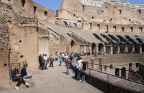 Italy, Lazio, Rome, Colosseum, interior view of the Colosseum with people walking around.