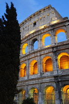 Italy, Lazio, Rome, Colosseum lit at night.