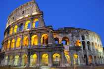 Italy, Lazio, Rome, Colosseum lit at night.