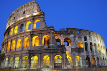 Italy, Lazio, Rome, Colosseum lit at night.