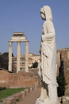 Italy, Lazio, Rome, Roman Forum, Foro Romano, House of Vestal Virgins with Temple of Castor & Pollux in  distance.