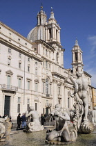 Italy, Lazio, Rome, Centro Storico, Piazza Navona, Fontana del Moro & church of Sant'Agnese in Agone.
