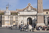 Italy, Lazio, Rome, Northern Rome, Piazza del Popolo, Obelisk & central fountain with Porta del Popolo.
