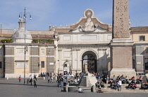 Italy, Lazio, Rome, Northern Rome, Piazza del Popolo, Obelisk & central fountain with Porta del Popolo.