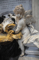 Italy, Lazio, Rome, Vatican City, St Peter's Square, St Peter's Basilica, marble angel detail of Holy water recepticle.