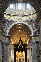 Italy, Lazio, Rome, Vatican City, St Peter's Square, St Peter's Basilica, central nave with Bernini's Baldacchino.