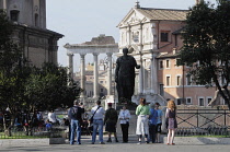 Italy, Lazio, Rome, Foro Romano, view onto Roman Forum with the Temple of Saturn from Via Fori Imperiale.