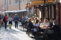 Italy, Lazio, Rome, Trastevere, Piazza di Santa Maria de Trastevere, cafes on the Piazza.