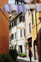 Italy, Lazio, Rome, Trastevere, Piazza de Santa Maria de Trastevere, narrow side street.