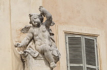 Italy, Lazio, Rome, Trastevere, church of Santa Cecilia, stone cherub detail.