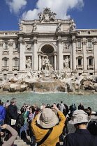 Italy, Lazio, Rome, Centro Storico, Trevi Fountain with crowds.