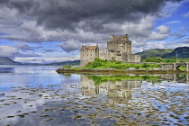 Scotland, Ross and Cromarty, Eilean Donan Castle with its reflection in Loch Alsh.