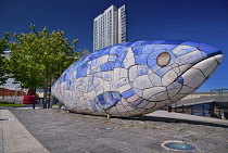 Northern Ireland, Belfast, Donegall Quay, The Big Fish Sculpture by John Kindness with the scales of the fish represented by pieces of printed blue tiles which show details of Belfasts history.