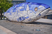 Northern Ireland, Belfast, Donegall Quay, The Big Fish Sculpture by John Kindness with the scales of the fish represented by pieces of printed blue tiles which show details of Belfasts history.
