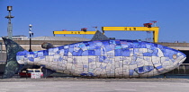 Northern Ireland, Belfast, Donegall Quay, The Big Fish Sculpture by John Kindness with the scales of the fish represented by pieces of printed blue tiles which show details of Belfasts history, in the...