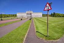 Northern Ireland, Belfast, Stormont, Northern Ireland Assembly building with traffic road sign in the foreground.