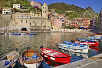 Italy, Liguria, Cinque Terre,  Vernazza, Church of Santa Margherita di Antiochia and the harbour.