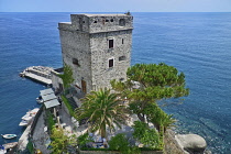 Italy, Liguria, Cinque Terre, Monterosso al Mare,  The Aurora Tower a 16th century defence structure against pirates with Ligurian Sea behind.