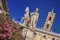 Italy, Lazio, Rome, Piazza del Campidoglio designed by Michelangelo, Angular view of the Statue of Castor with the Palazzo Senatorio in the background.