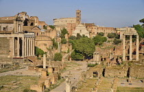 Italy, Lazio, Rome, View of the Roman Forum from Capitoline Hill in evening light with the Colosseum in the background.
