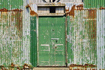 Ireland, County Donegal, Inishowen, Fort Dunree, Doorway of abandoned military barracks.